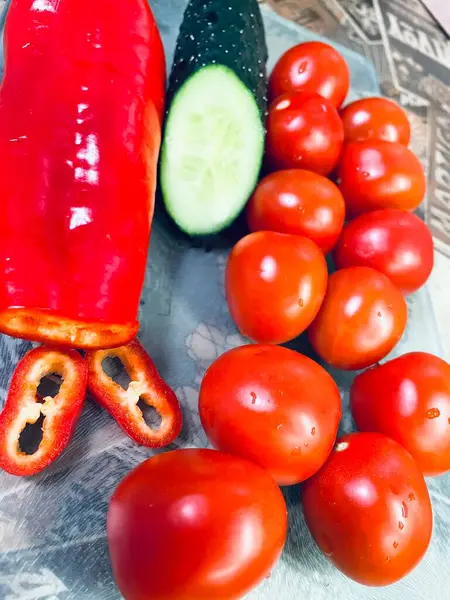 Vegetables, kitchen, benefits, health, vitamins, spring, bright, pepper, tomato, tomatoes, cucumber, kitchen, cut, table, board, knife, cook, tasty, useful, red, green