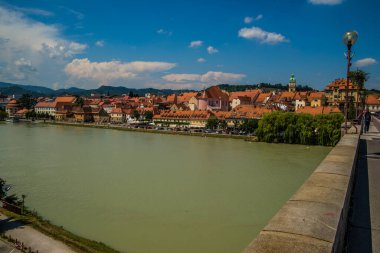 Maribor, Slovenia, river, vineyards, architecture, culture, tourism, trip, travel, walk, Pohorje, mountains, skiing, history, festivals, Lent Festival, university, economy, castles, churches, old town, green city. clipart