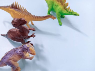 Bir grup plastik oyuncak dinozor. Kid Dino Oyuncakları Arkaplan Kavramı