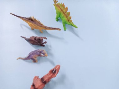 Bir grup plastik oyuncak dinozor. Kid Dino Oyuncakları Arkaplan Kavramı