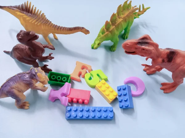 Group of a plastic toy dinosaurs. Kid Dino Toys Figure background Concept
