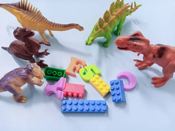 Group of a plastic toy dinosaurs. Kid Dino Toys Figure background Concept