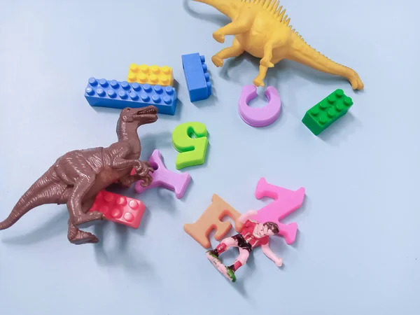Dzieciak Tle Kolorowe Bloki Zabawki Alfabetu Zabawki Dinozaurów Ramki Tle — Zdjęcie stockowe