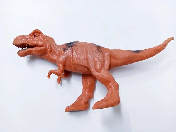 stock image Tyrannosaurus rex dinosaur Toy Figure. Plastic dinosaur toy isolated on white background. Tyrannosaurus is a genus of large theropod dinosaur called T-Rex