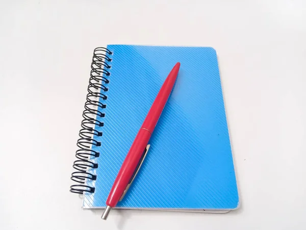 Close Blue Note Book Diary Book Red Pen Isolated White Stock Photo