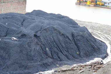 Indonesian steam coal dumb in open fields, Coal storage stock photo