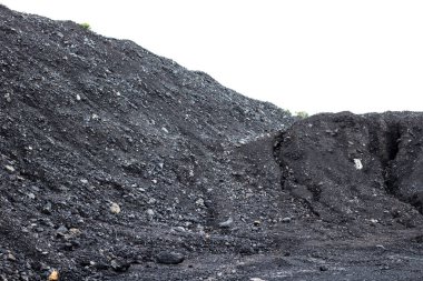 Indonesian steam coal dumb in open fields, Coal storage stock photo