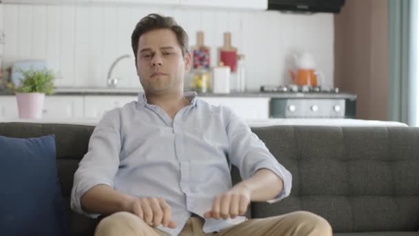 Portrait Stressed Man Sitting Sofa Home Living Room Young Man — Stock Video