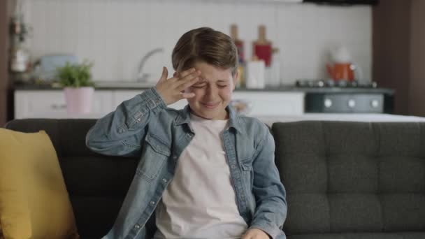Little Boy Has Headache Holding His Head His Hands Little — Stock Video