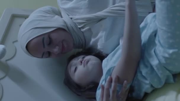 Mother Hijab Little Daughter Having Fun Talking Bedroom Lying Bed — Stock Video