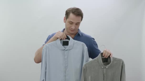 Man Can Decide Which Shirt Wear Being Able Decide Choice — Stock Video