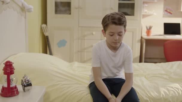 Cute Sad Boy Sitting Alone Bed His Room Child Who — Stock Video