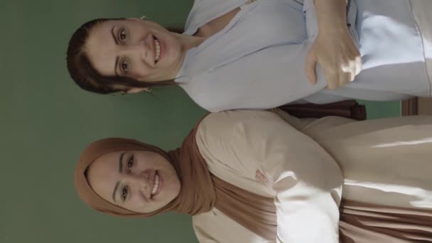 Female Teacher Hijab Female Colleague Classroom Arms Folded Front Blackboard — Stock Video