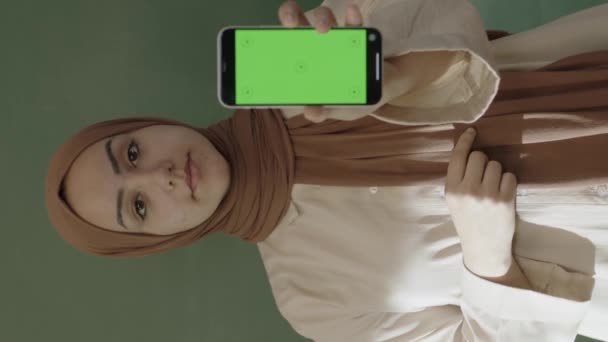 Classroom Teacher Hijab Looks Social Media Accounts Her Smartphone Browses — Vídeo de stock