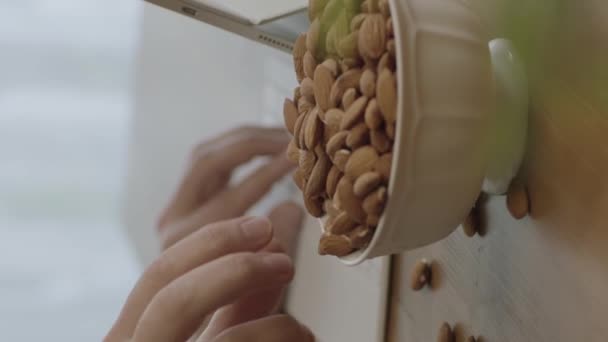 Freelance Man Drinks Coffee Eats Roasted Almonds Hazelnuts Cookies While — Video Stock