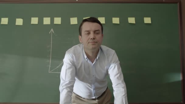 Male Teacher Standing Front Blackboard Glued Notes Chalk Drawn Math — Stock videók