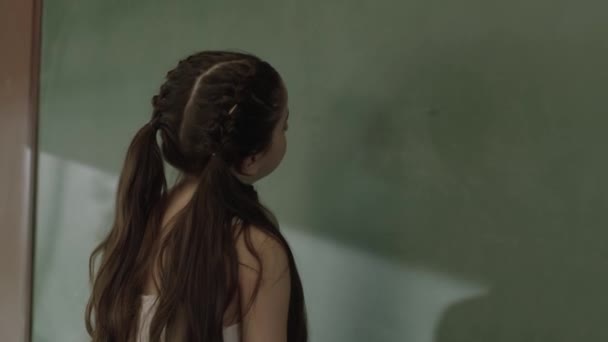 Little Sad Girl Standing Front Green Chalkboard Her School Little — Stock video