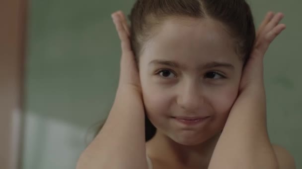 Little Girl Angrily Covers Her Ears Annoyed Loud Noise School — Vídeo de stock