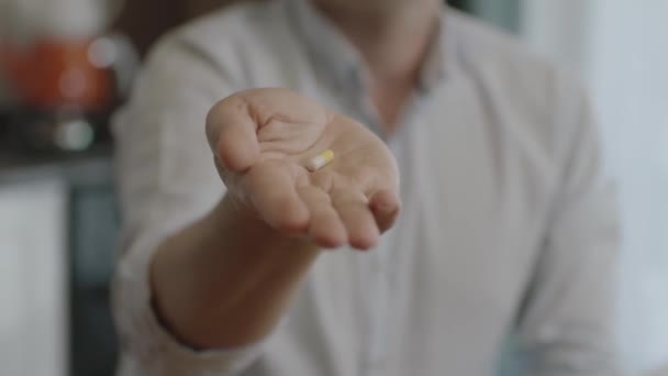 Hand Person Holding Pill Camera Man Holds Yellow Pill His — 비디오