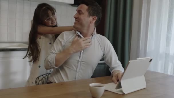 Young Father Working Remotely Laptop Kitchen Little Girl Hugs Her — 비디오