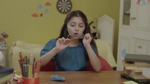 Bored Schoolgirl Wiping Her Glasses Table Her Home Sad Child — Stock video