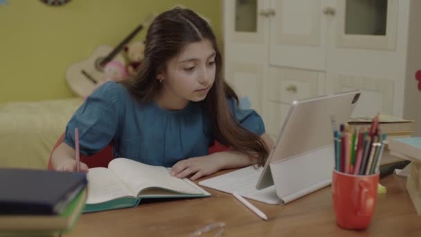Little Girl School Student Studying Online Home Listening Teachers Video — Vídeo de stock
