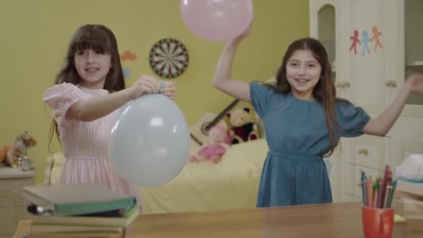 Little Girls Blowing Air Balloon Happy Birthday Party Celebration Children — 图库视频影像