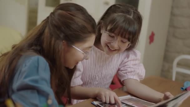 Happy Cute Little Girls Looking Photo Album Remembering Memories Laughing — Stok video