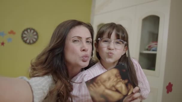 Little Girl Holding Image Her Unborn Siblings Ultrasound Girl Takes — Vídeo de Stock