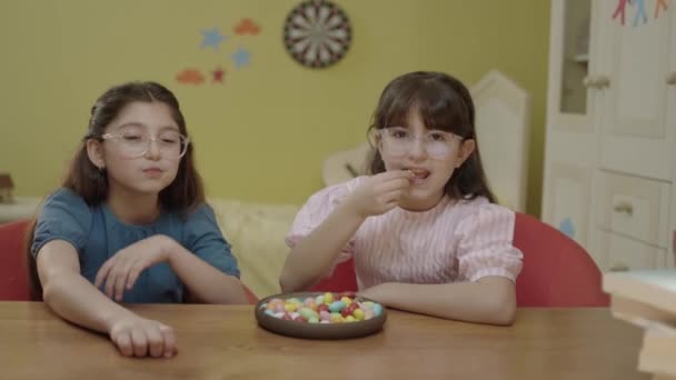 Little Girls Take Break School Homework Classes Eat Colorful Candies — Αρχείο Βίντεο