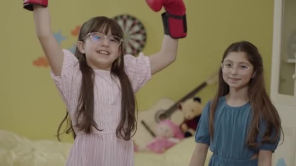 Little Girl Boxing Gloves Her Friend Having Fun Together Home — Stockvideo