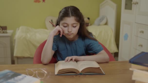 Little Girl Long Hair Reading Book Her Room Cute Little — Stockvideo