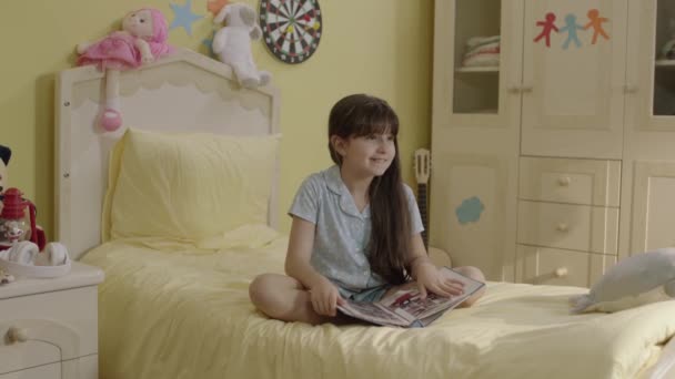 Happy Cute Little Girl Looking Childhood Photos Herself Her Album — Stockvideo