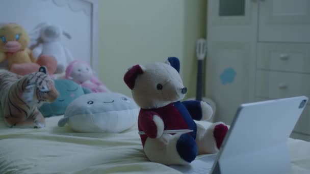 Teddy Bear Tablet Computer Bed Nursery Cute Teddy Bear Looking — Vídeo de Stock