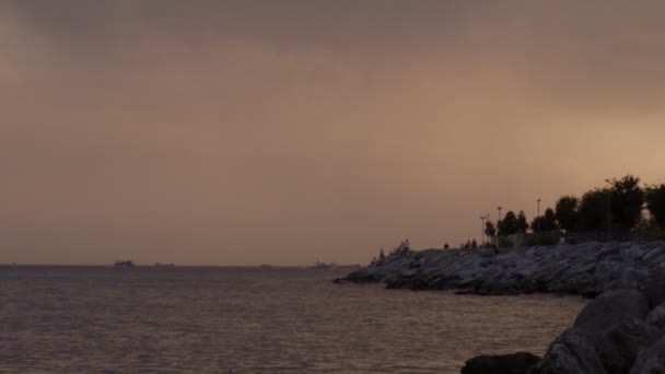 People Fishing Fishing Rods Rocks Sea Sunset Wonderful Aerial Panoramic — Video Stock