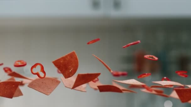 Close Shot Sliced Salami Pepper Flying Camera Kitchen Background Salami — Stockvideo