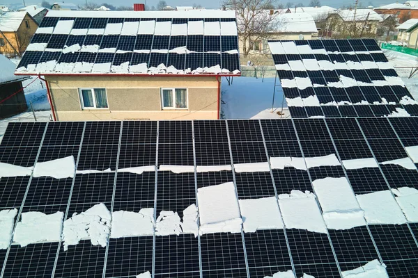 Aerial View House Roof Solar Panels Covered Snow Melting Winter — Zdjęcie stockowe