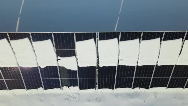 Aerial View Snow Melting Covered Solar Photovoltaic Panels Sustainable Electric — Vídeos de Stock