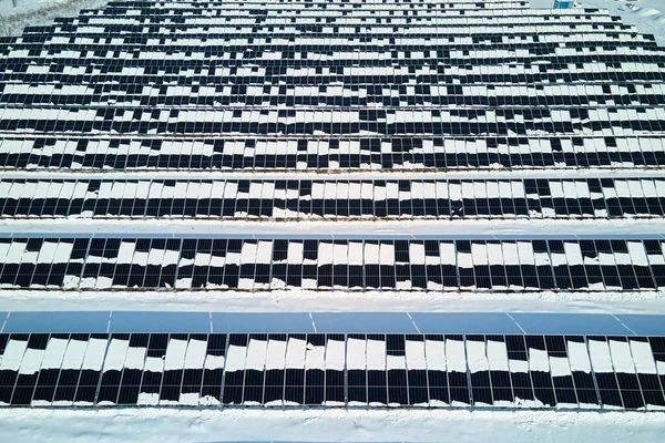 Aerial View Electrical Power Plant Solar Panels Covered Snow Melting — Fotografia de Stock