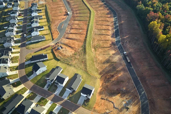 stock image Aerial view of construction site with new tightly packed homes in South Carolina. Family houses as example of real estate development in american suburbs.