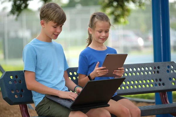 Two Children Teenager Boy Laptop Computer Young Girl Digital Tablet —  Fotos de Stock