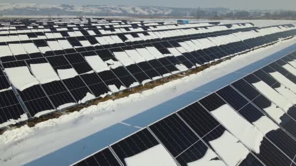 Aerial View Snow Melting Covered Solar Photovoltaic Panels Sustainable Electric — Stock video