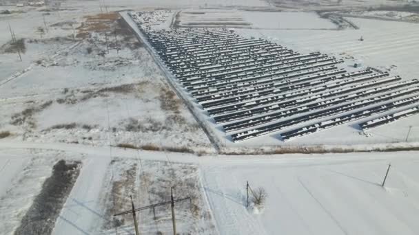 Aerial View Snow Melting Covered Solar Photovoltaic Panels Sustainable Electric — ストック動画