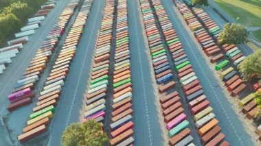 View from above of cargo container industrial yard with many shipment freight containers. Concept of international delivery of goods. Brunswick, USA - October 11, 2022.