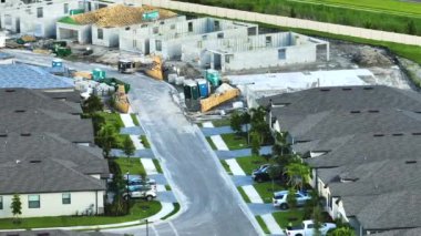 High angle view of residential development area with tightly located family houses under construction in Florida suburbs. Concept of growing american real estate market.