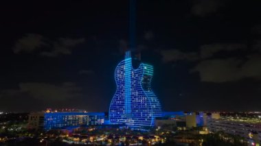 Aerial view of guitar shaped Seminole Hard Rock Hotel and Casino structure in Florida.