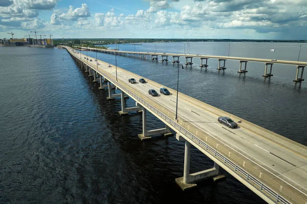 stock image Barron Collier Bridge and Gilchrist Bridge in Florida with moving traffic. Transportation infrastructure in Charlotte County connecting Punta Gorda and Port Charlotte over Peace River.