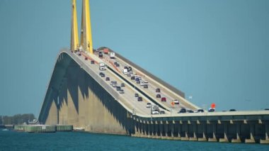 Sunshine Skyway Bridge over Tampa Bay in Florida with moving traffic. Concept of transportation infrastructure.