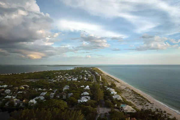 Aerial view of rich neighborhood with expensive vacation homes in Boca Grande, small town on Gasparilla Island in southwest Florida. American dream homes as example of real estate development in US.