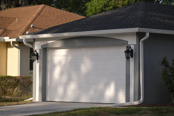 Wide Garage Double Door Concrete Driveway New Modern American House — стоковое фото